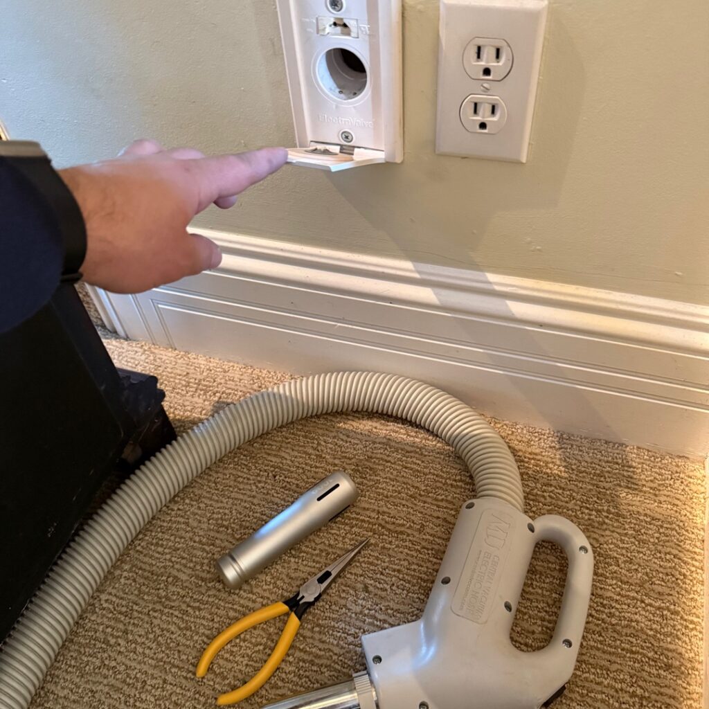 central vacuum outlet and tools to repair